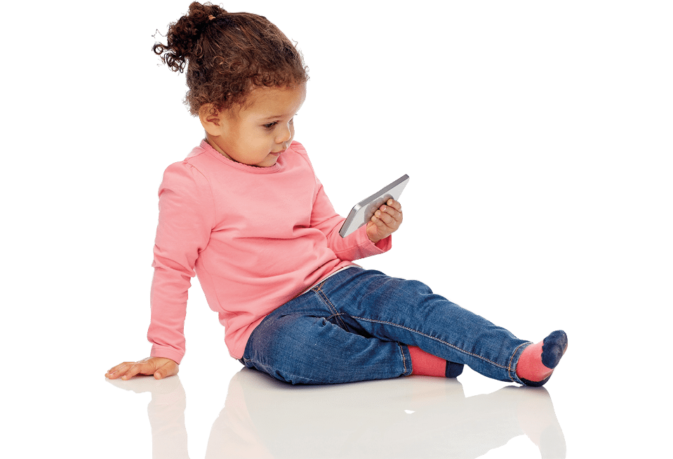 childhood, technology and people concept - smiling little african american baby girl playing with smartphone and sitting on floor