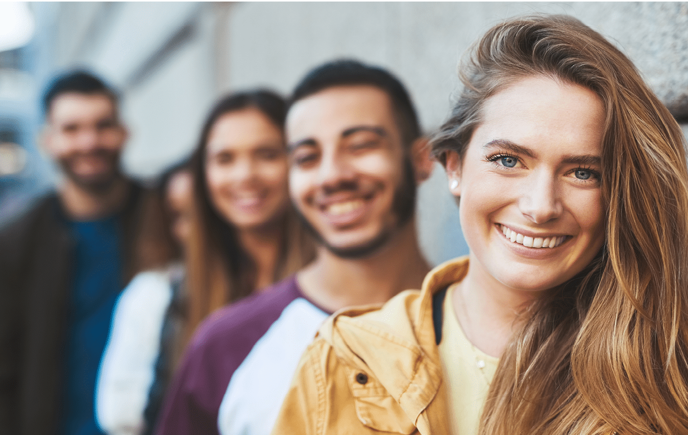 Cropped shot of friends standing together while out in the city.